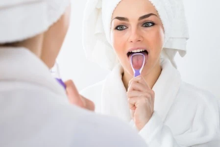 Is Tongue-Scraping Worthwhile? Ask Our Dentist